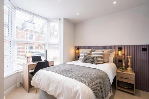 Bright and inviting double bedroom featuring a ...