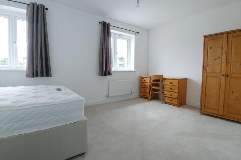 Bright, airy master bedroom with two windows, n...