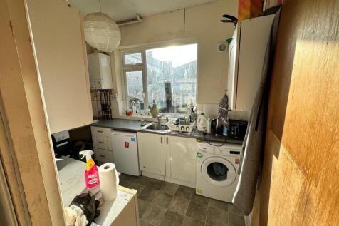 A bright and functional kitchenette with ample ...