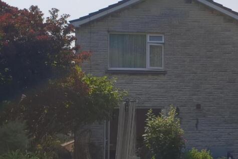 A charming exterior view of the property surrou...