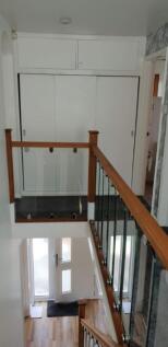 A bright and tidy hallway with stylish features...