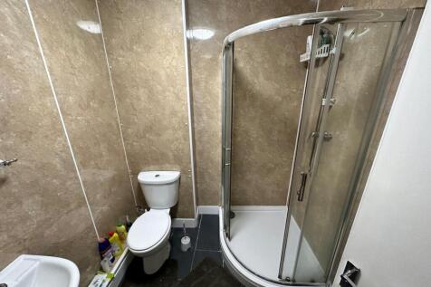 A modern and clean bathroom featuring a stylish...