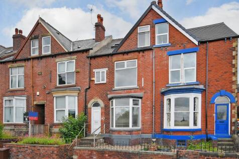 Attractive red-brick terraced house with bay wi...
