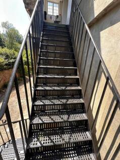 External metal staircase with sturdy railings l...