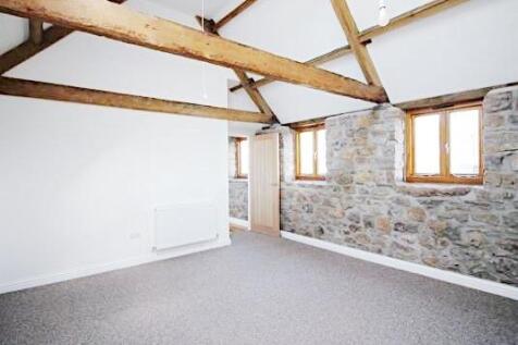 Bright, characterful bedroom with exposed woode...