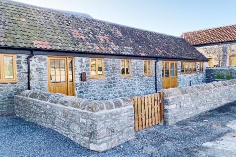 Charming stone-front cottage with timber-framed...
