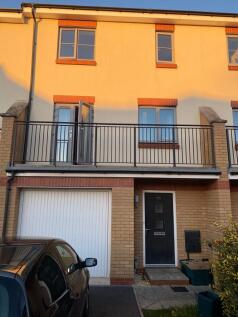 Contemporary mid-terrace house with a secure ga...