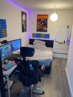 Bright, modern double bedroom with a comfy bed,...