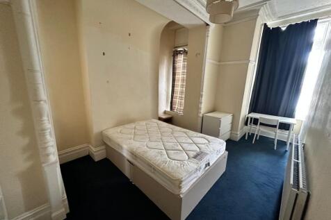 Bright double bedroom with a double divan bed, ...