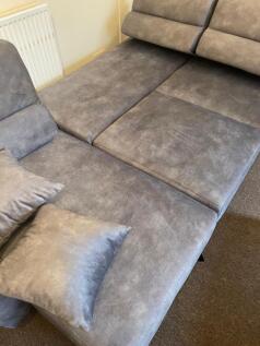 Contemporary grey upholstered corner sofa with ...