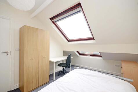 Bright attic double bedroom with large skylight...