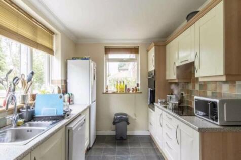 A bright and functional kitchen equipped with m...