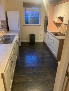 A functional kitchen with ample counter space a...