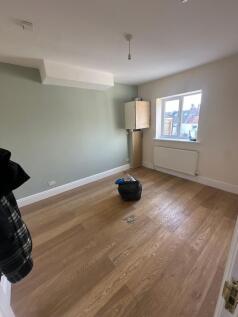 Bright, recently refreshed bedroom with new woo...