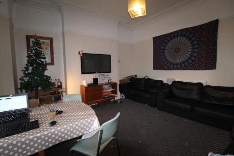 Inviting communal living room with comfortable ...