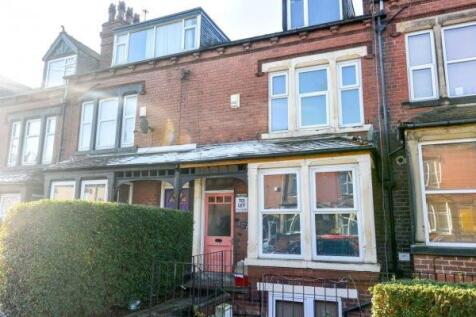Charming red-brick terraced house with bay wind...