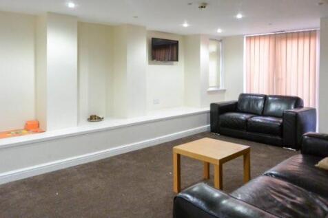 Comfortable furnished living room with leather ...