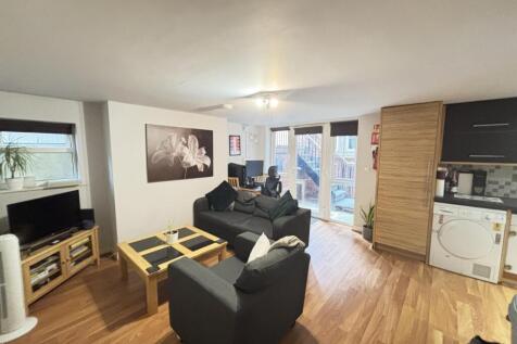 A bright and spacious contemporary living area ...