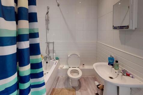 A clean and well-maintained bathroom featuring ...