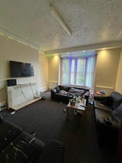 Comfortable communal living room with multiple ...