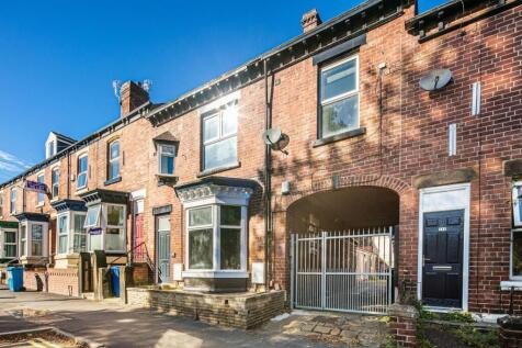 Attractive red-brick terraced property with bay...
