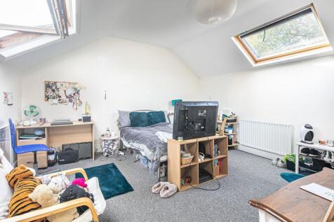 Bright, airy double bedroom in a loft-style spa...