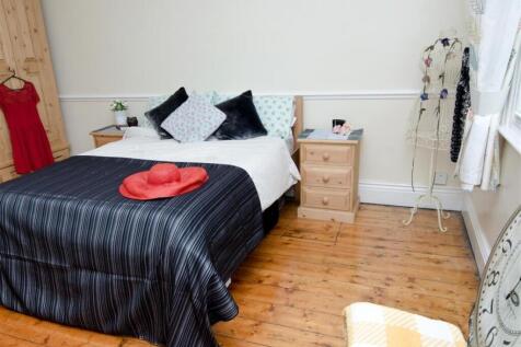Bright, neatly presented bedroom with polished ...