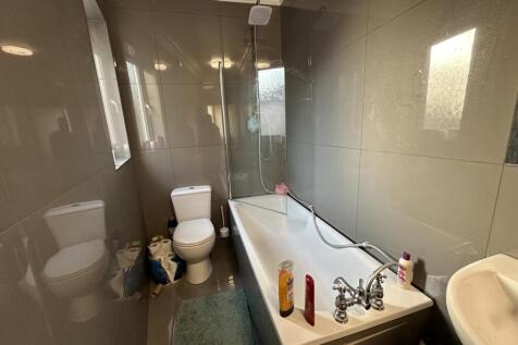 A modern, well-maintained bathroom featuring a ...