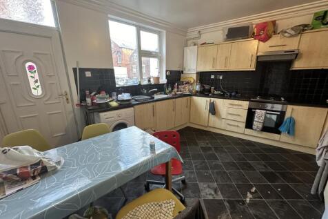 A functional kitchen with ample workspace and n...