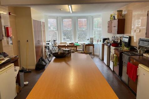 Spacious kitchen area featuring ample counter s...