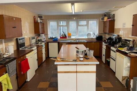 This spacious kitchen features ample counter sp...