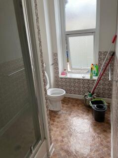Bright and functional bathroom featuring a spac...