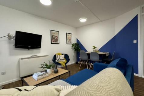 A spacious and stylish modern living room, perf...