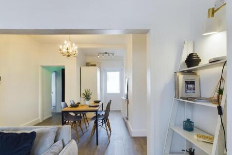 A spacious and stylish modern living room, perf...