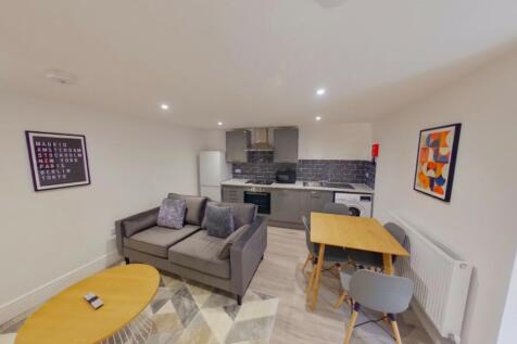 A stylish and spacious modern living room perfe...