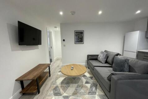 A spacious and stylish modern living room, perf...