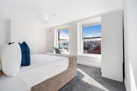 Bright, freshly decorated double bedroom with t...