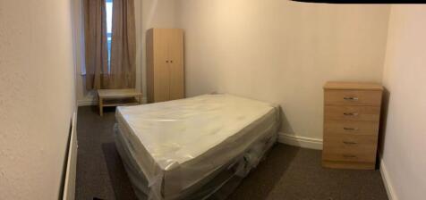 Simple furnished bedroom with a double mattress...