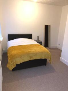 Neatly presented double bedroom with a stylish ...