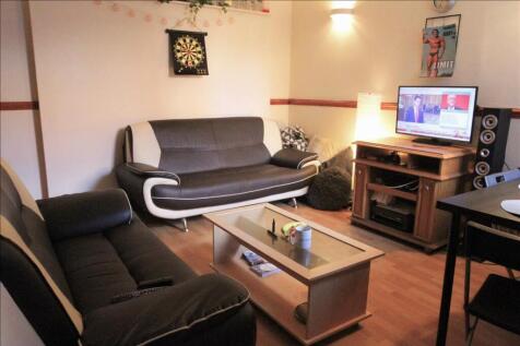 This inviting living room features stylish seat...