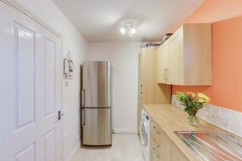 Bright and functional kitchen featuring modern ...