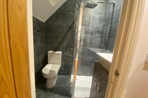 A modern and clean bathroom featuring a stylish...