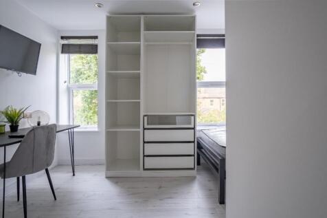 A beautifully designed double bedroom featuring...