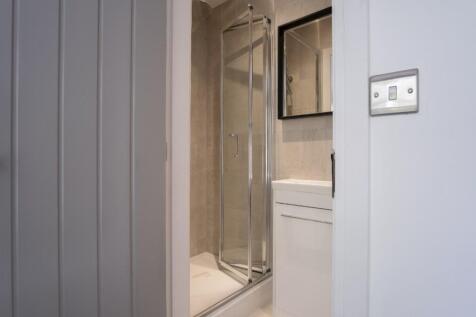 A modern and well-maintained bathroom featuring...