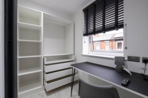 This well-organized communal workspace features...