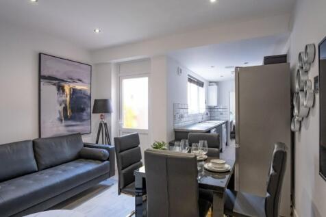 This inviting living room features a contempora...