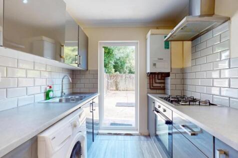 Bright and modern kitchen with sleek appliances...