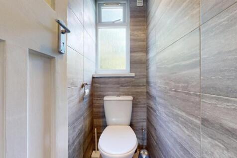A modern and well-maintained single toilet room...