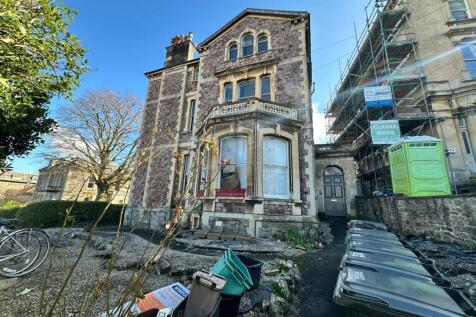 Charming front view of a historic property show...