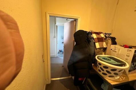 A cozy hallway with practical storage solutions...